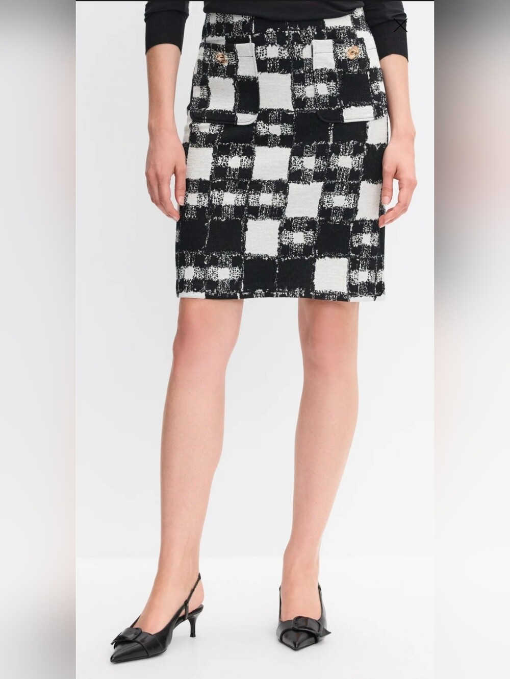 Black and white checkered skirt with gold buttons texture feels like Soft Wool